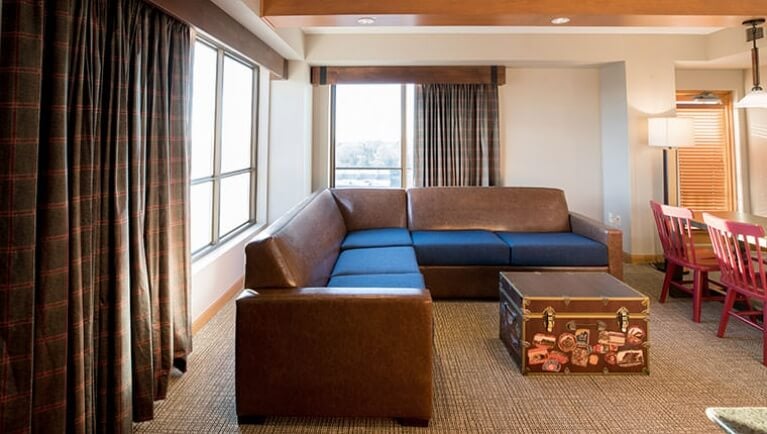 The living area and couch in the Majestic Bunk Bed Suite